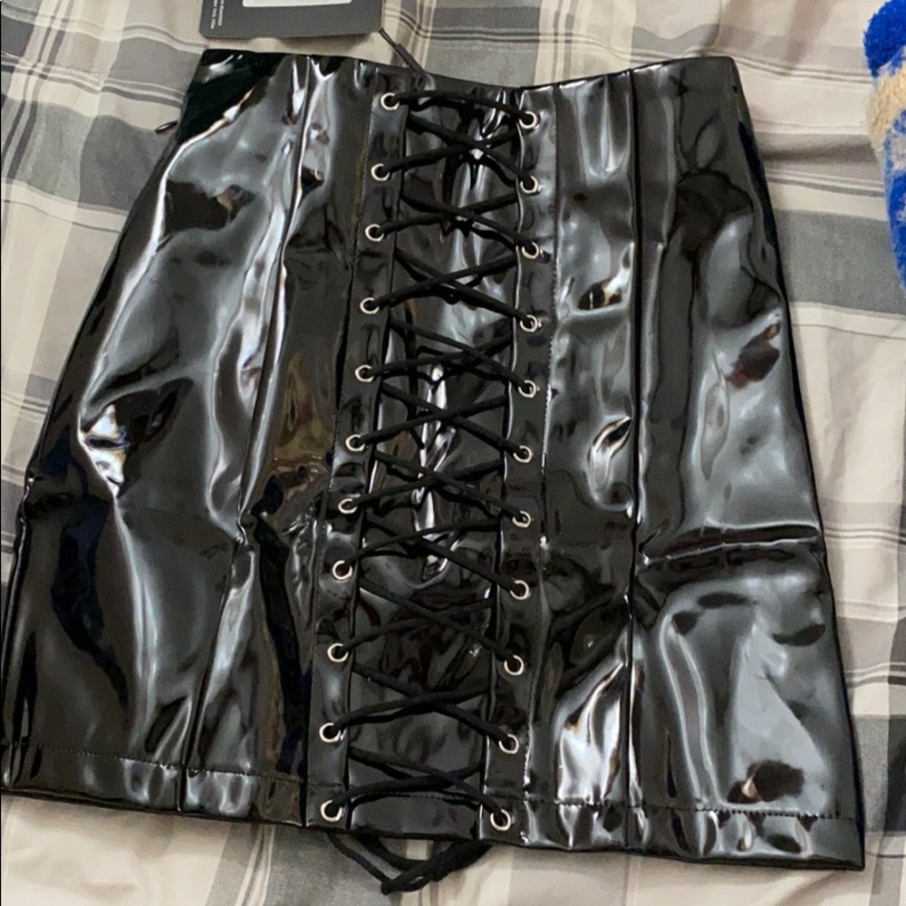 Pretty little things black vinyl lace up mini skir